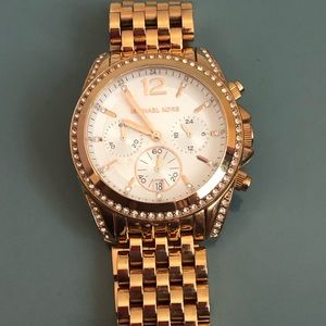 Women’s Michael Kors gold watch